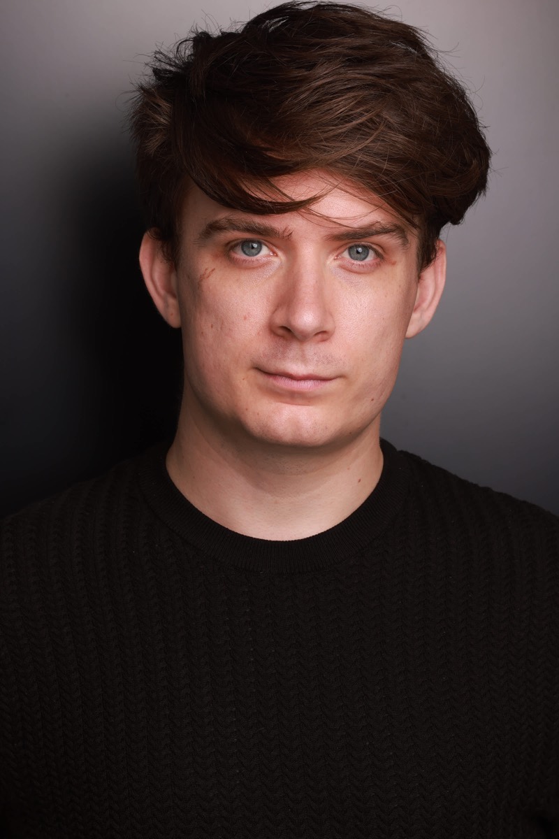 Headshot of Rhys