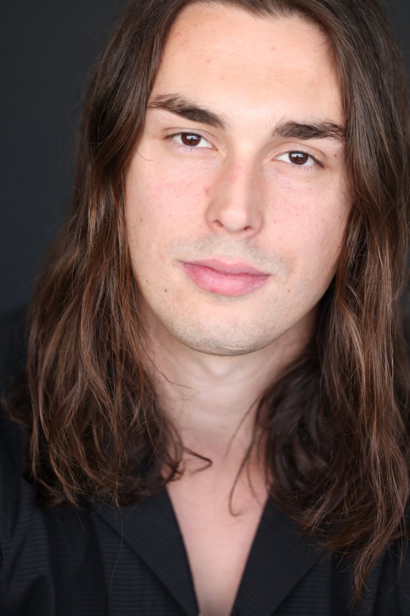 Headshot of Regan